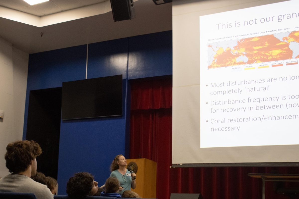 Dr. Margaret Miller, Research Director for SECORE International, speaks to MAST Academy students about coral reefs in the schools auditorium on Sept. 15, 2023.