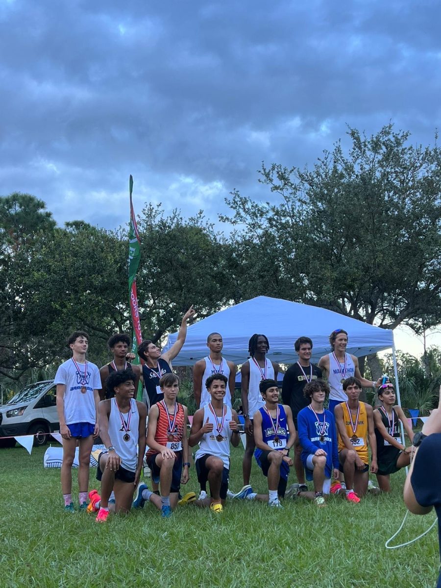 Sophomore Robert Garcia (Fourth in Top Row) posing with his 4th Place Varsity